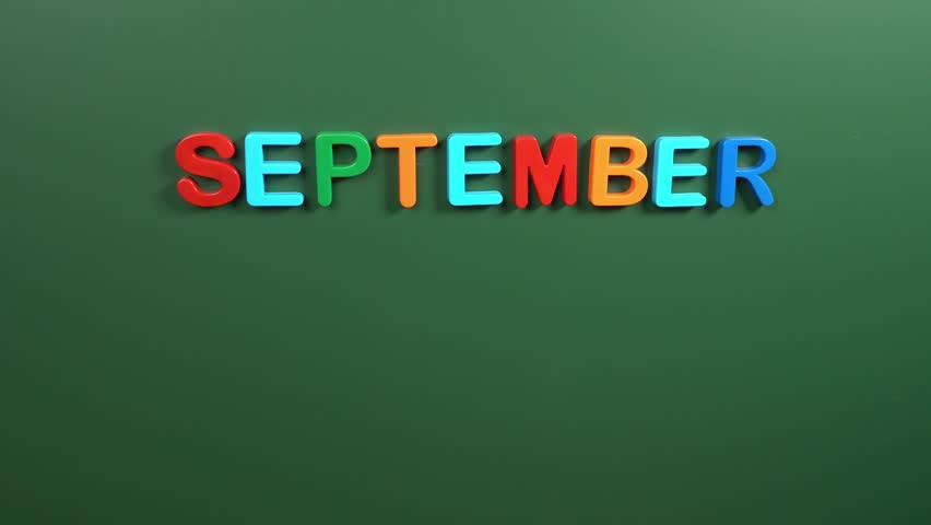 Hand sticking a sticker 1 September calendar day on school board. 1 date of September. First day of September. 1st date number. 1 day calendar. One date. Knowledge Day, Constitution of Slovakia | Shutterstock HD Video #1101924325
