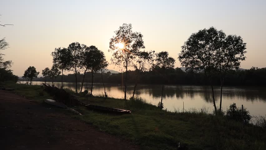 Video background Nature evening of changing colors of the sun in the mountains, surrounded by rivers and mangroves, the integrity of the ecosystem.