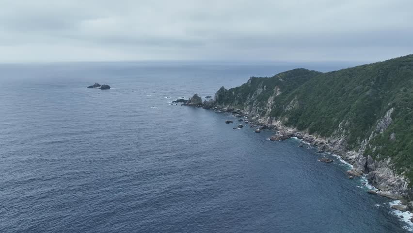 The cape and the sea beyond