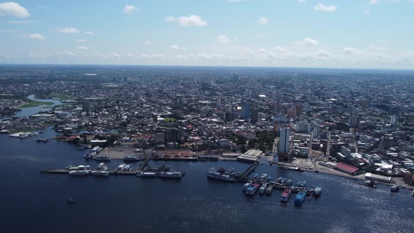 Aerial panoramic view of Manaus, Amazonas state, Brazil. The Negro river is seen at the bottom.
