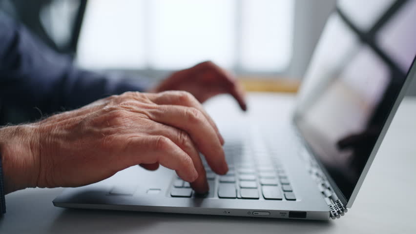 Closeup View Of Mature Man Hands On Keyboard Of Laptop, Elderly Person Typing Text On Modern PC - Powered by Shutterstock - Get 15% off with code: PIKWIZARD15