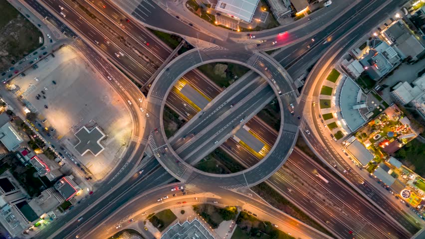 Aerial time lapse view of multilevel junction ring road during night time as seen in Attiki Odos motorway interchange with Kifisias Avenue in Marousi Attica, Athens, Greece Royalty-Free Stock Footage #1101938005