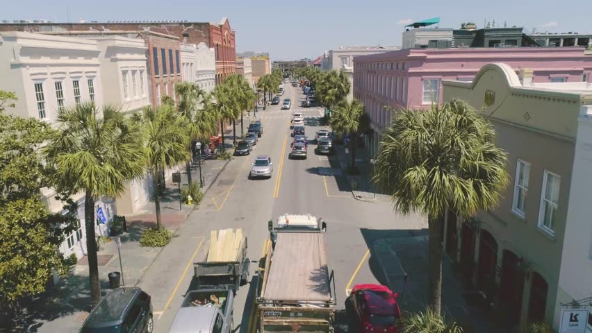 Charleston South Carolina Drone of Cars in traffic on busy street with shops and tourism