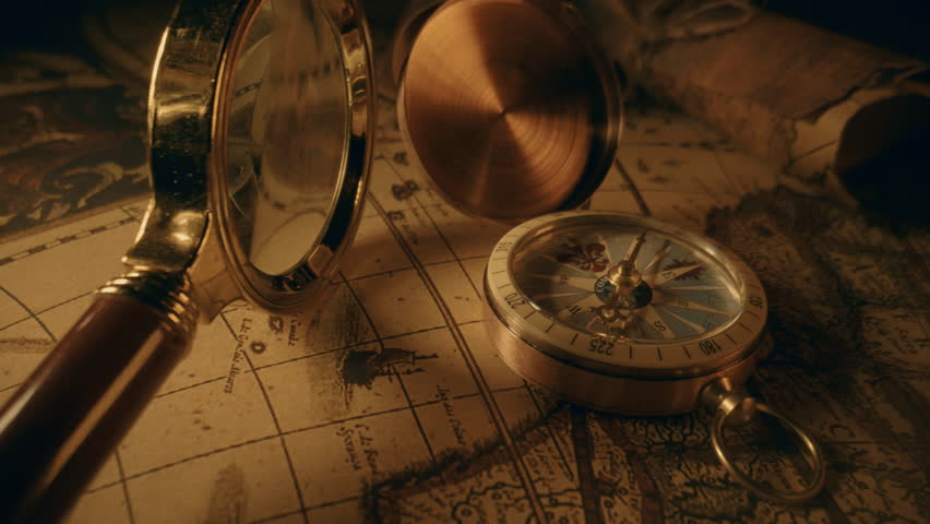 Compass and magnifier on a old vintage world map with countries and continents. Retro style. Concept of geography or global history and cartography. Wars of conquest and navigation. 4K ProRes