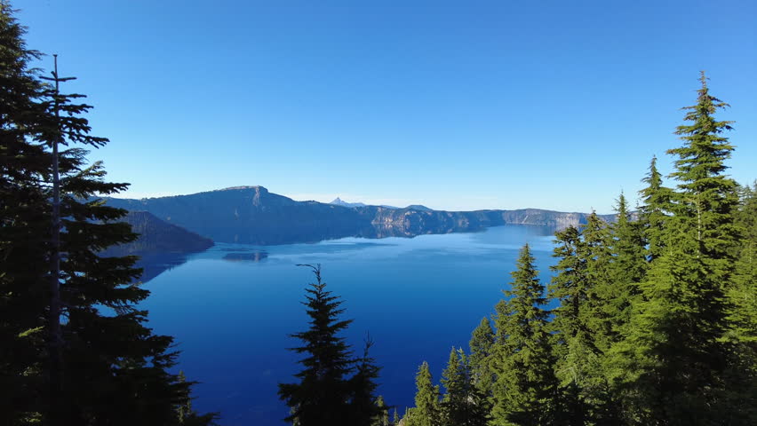 Walking Along the Rim at Crater Lake on clear summer day