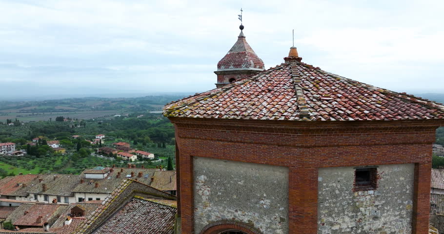 Collegiata di San Michele Arcangelo, Roman Catholic Church In Piazza del Tribunale, Lucignano, Tuscany, Italy. - aerial