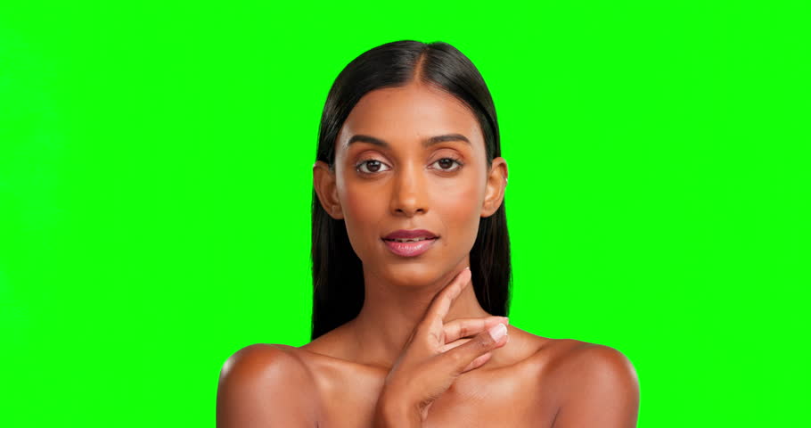 Woman, serious and skincare of face on green screen, studio and color background. Beauty, dermatology and portrait of female model for healthy aesthetic glow, soft results and self love on backdrop | Shutterstock HD Video #1101962719