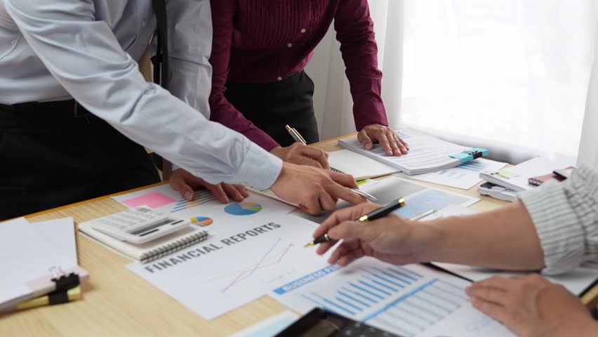 Business team discussing meetings and briefing strategies. business strategies for profitable economists and marketers Make investment and financial plans to prevent risks and losses for the company. | Shutterstock HD Video #1101967739