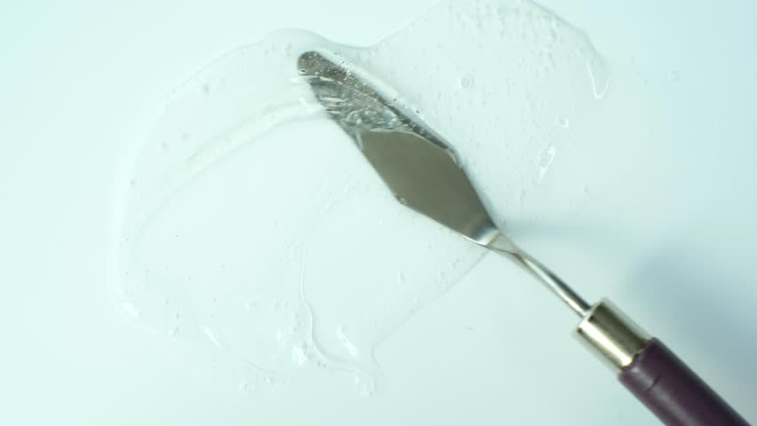 Smear of shower gel or shampoo on white background close-up top view. | Shutterstock HD Video #1101975561