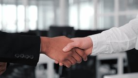 Close-up handshake agreement between European woman and Indian man, representing multinational office workers. Executive leaders shaking hands at office meeting. Partnership and investment concept. - Powered by Shutterstock - Get 15% off with code: PIKWIZARD15