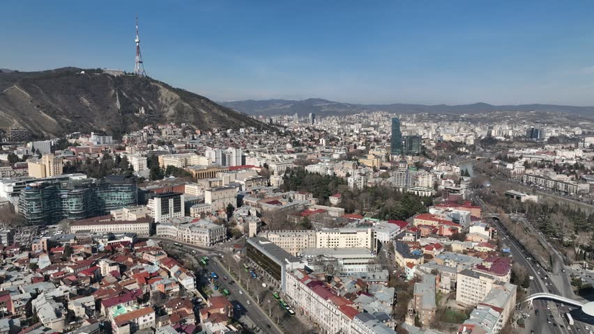 Aerial view of center of Tbilisi under Mount Mtatsminda. Georgia 2023 Royalty-Free Stock Footage #1101985405