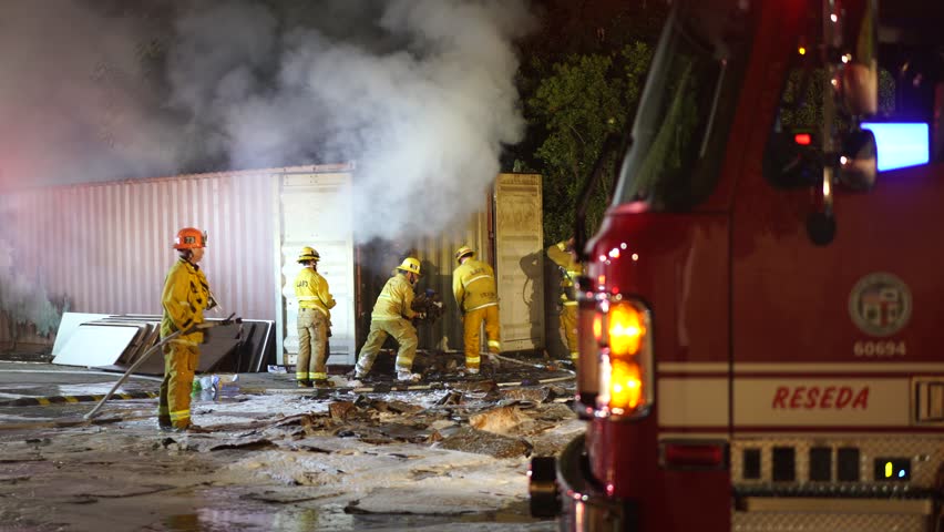 Los angeles , United States - 03 22 2023: firefighters extinguish trash fire hd