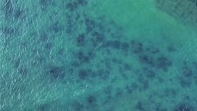 Sea surface aerial footage. Ocean ripple water background.