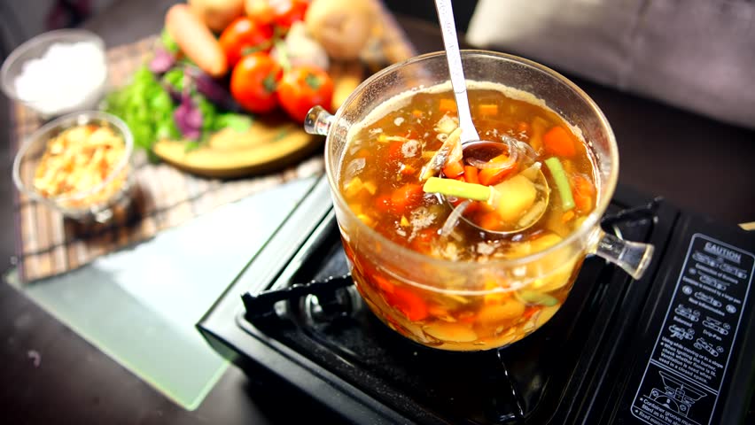 Creole Potato Soup. Vegetable Hot Dish Lunch Traditional Italian Dinner Meal. Diet Vegan Gourmet Dish. Boiling Pot Vegetable Potato Soup. Vegetables Soup On Stove. Vegetarian Dinner Meal On Dieting