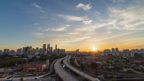Time Lapse: Breathtaking day to night of cityscape (Kuala Lumpur) visible- Zoom Effect
