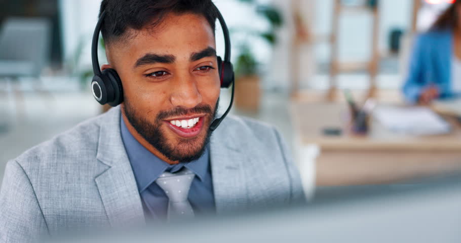 Businessman, call center and face consulting with headphones on computer for customer service or support. Happy male consultant agent with smile talking on PC headset for online advice at workplace | Shutterstock HD Video #1102018607