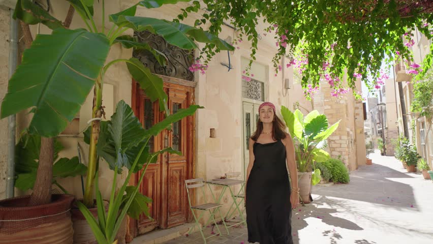 Woman tourist enjoying Bay Of Chania At Sunny Summer Day In Crete, Greece
 Royalty-Free Stock Footage #1102036395