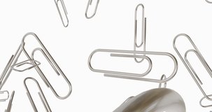 Paper clips. A lot of metal clips in motion on a white background. 4K seamless looping videos