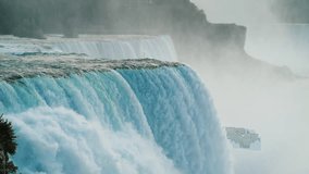 Slow motion 180 fps video: The amazing Niagara Falls, the water of a beautiful blue hue