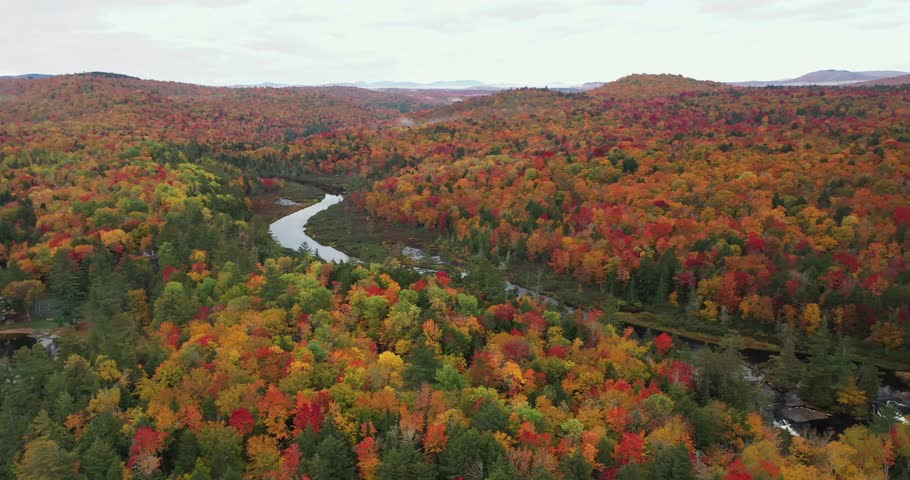 Aerial view of Bog River Falls near Tupper Lake in Adirondack Park in Upstate New York during fall.