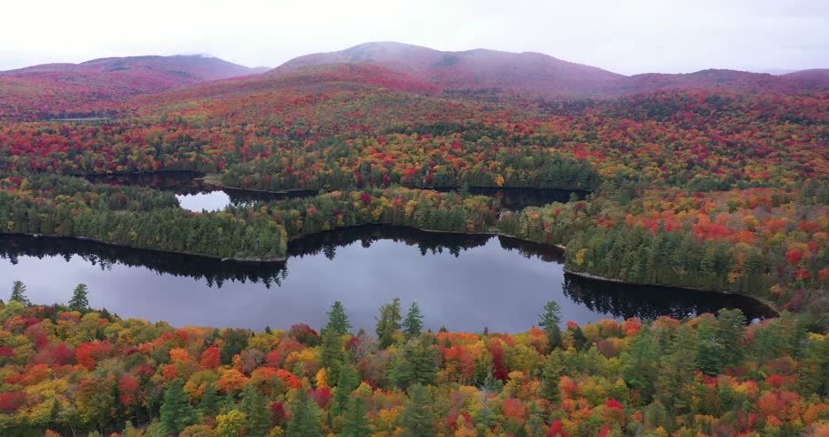 Aerial view of the Adirondack Interpretive Center nature area on a misty day during autumn in Upstate New York.