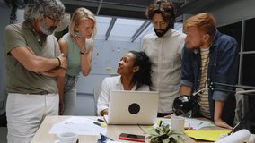 Diverse team of business professionals gathered in office conference room. Creative group around table female leader. Colleagues talk marketing campaign, social media strategy. People modern workplace - Powered by Shutterstock - Get 15% off with code: PIKWIZARD15