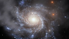 Pinwheel Spiral Galaxy (also known as Messier 101, M101 or NGC 5457) Turning in Deep Space. Elements of this Video furnished by NASA. 4K Resolution.