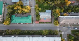 Autumn urban landscape, drone point of view. Residential district of small city, aerial footage.