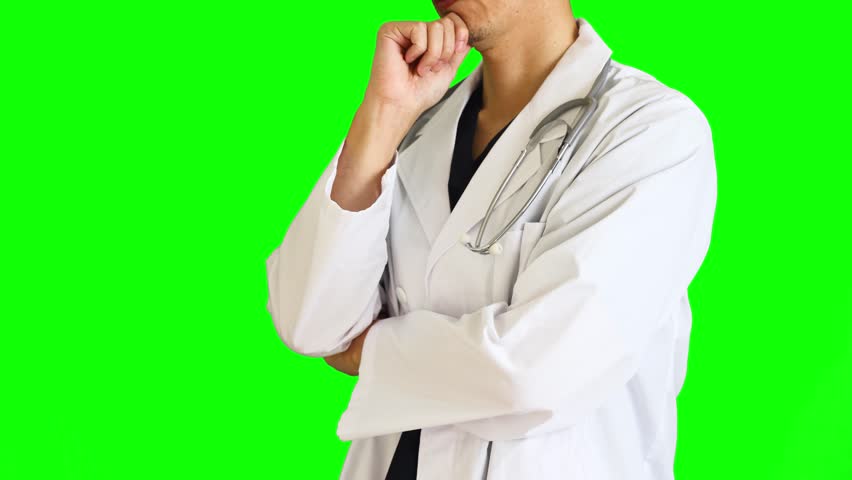 A doctor or nurse who thinks by touching his chin with his hand. Taken from the side. For chromakey compositing. | Shutterstock HD Video #1102053541