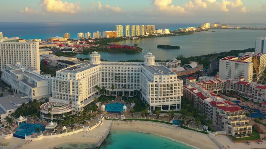 Cancun resort aerial view. Punta Norte beach, Cancun, Mexico. Close up view of the luxury hotels, palms, pools and beach. Luxury holiday concept at the Caribbean.