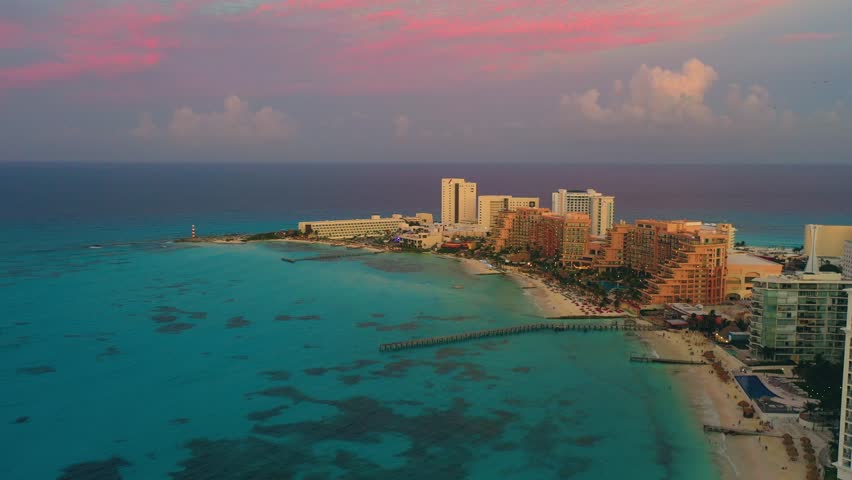 Cancun resort aerial view. Punta Norte beach, Cancun, Mexico. Close up view of the luxury hotels in Cancun. Palms, pools and beach. Luxury holiday concept at the Caribbean.
