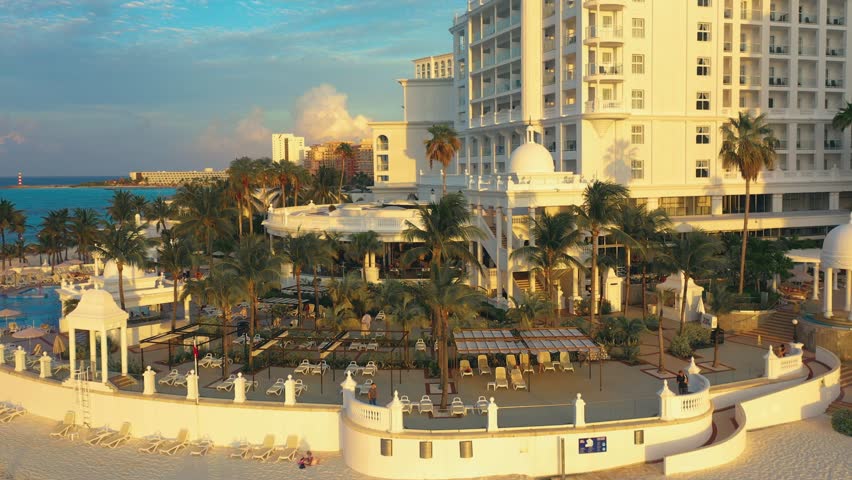 Cancun resort aerial view. Punta Norte beach, Cancun, Mexico. Close up view of the luxury hotels in Cancun. Palms, pools and beach. Luxury holiday concept at the Caribbean.