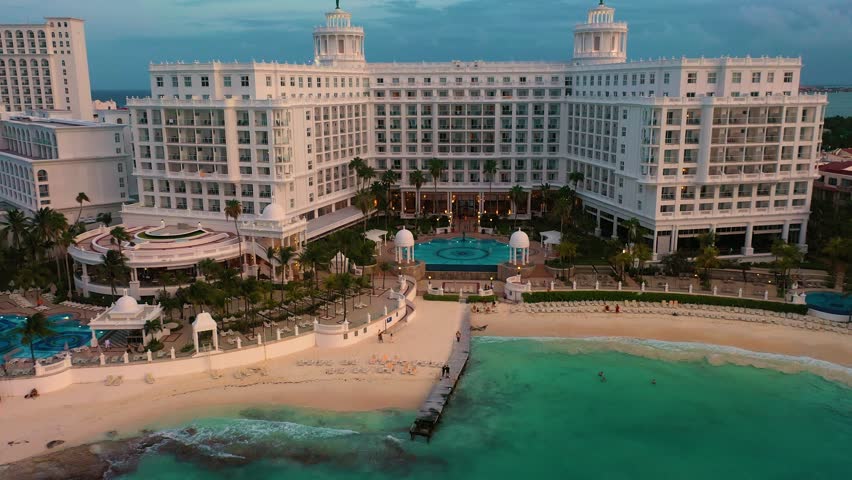 Cancun resort aerial view. Punta Norte beach, Cancun, Mexico. Close up view of the luxury hotels in Cancun. Palms, pools and beach. Luxury holiday concept at the Caribbean.