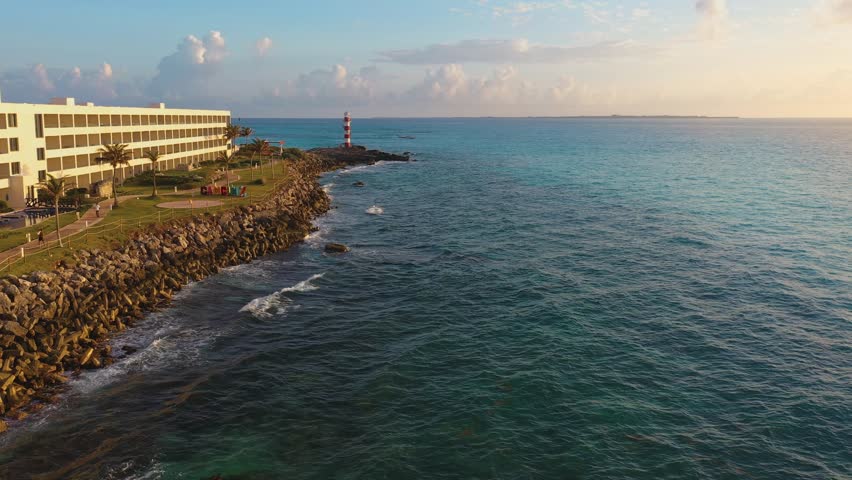 Aerial view of rocky shore in Cancun hotel zone, Mexico. Caribbean sea. Punta Cancun LightHouse