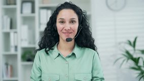 Webcam view Corporate operator talk in customer support service on helpline telesales Smiling woman representative call center agent in wireless headset helping client with complaints in office - Powered by Shutterstock - Get 15% off with code: PIKWIZARD15