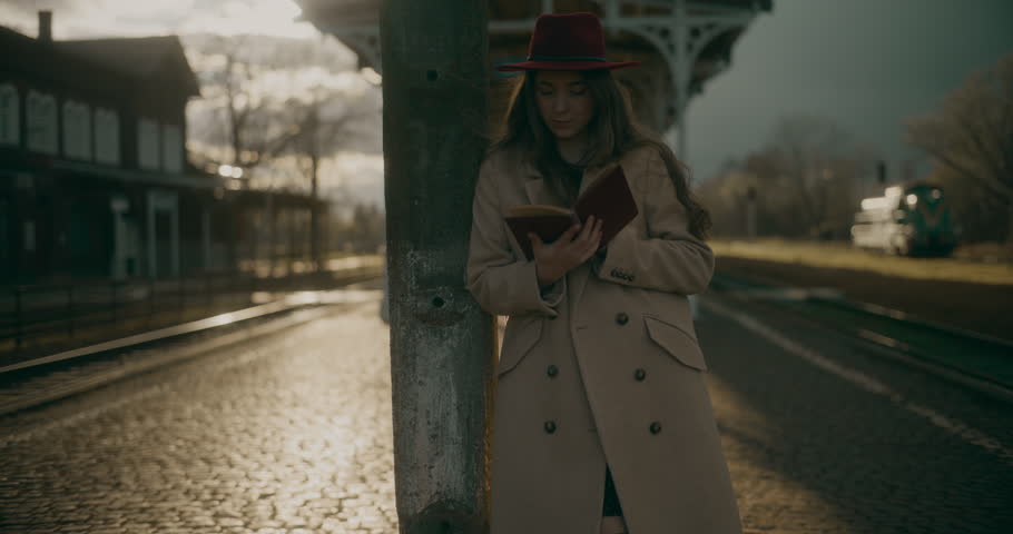 Pensive Thoughtful Woman At Railway Station