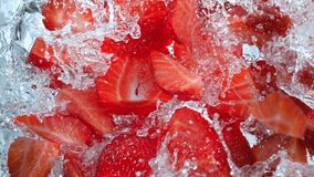 Super Slow Motion Shot of Fresh Strawberries Falling into Water Whirl at 1000 fps. - Powered by Shutterstock - Get 15% off with code: PIKWIZARD15