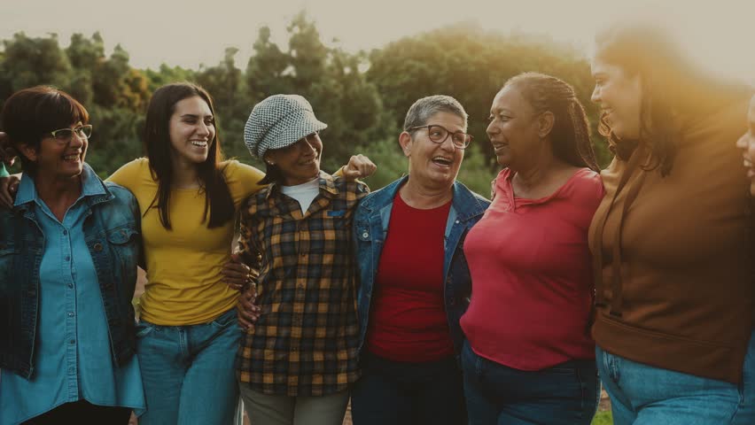 Happy multigenerational group of women with different ethnicities having fun in a public park - Females empowerment concept Royalty-Free Stock Footage #1102090973