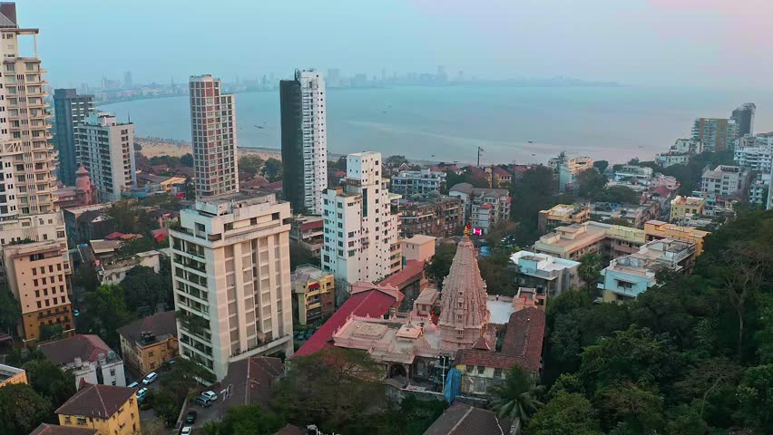 Mumbai Babulnath Shiva temple at  Girgaum Chowpatty, Maharashtra, aerial drone view 4k