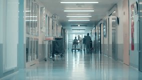 Surgeons are rolling a bed along the hospital hallway - Powered by Shutterstock - Get 15% off with code: PIKWIZARD15
