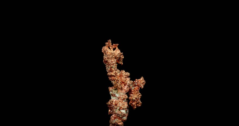 native copper (Cu) 360° rotation in 4k. macro detail texture background. close-up raw rough unpolished semi-precious gemstone