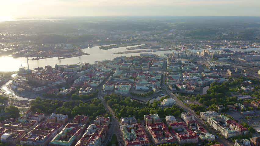Inscription on video. Gothenburg, Sweden. Panorama of the city and the river Goeta Elv. The historical center of the city. Sunset. On the mechanical display, Aerial View, Point of interest