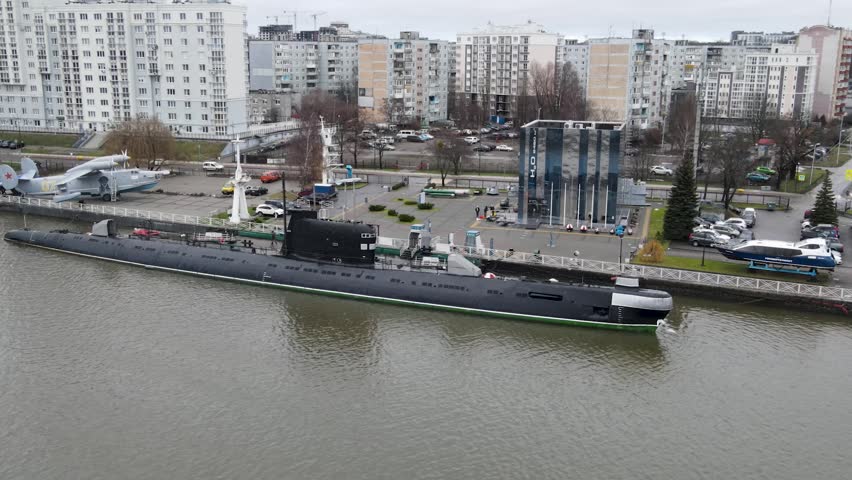 black submarine on the Pregolya River in the port of Kaliningrad, Russia. selective focus