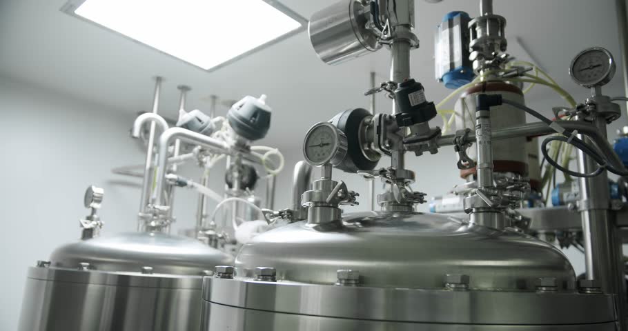 Pharmaceutical technology equipment facility for water preparation, cleaning and treatment at pharmacy plant. Water purification system equipment. Interior of water treatment plant. Royalty-Free Stock Footage #1102117183