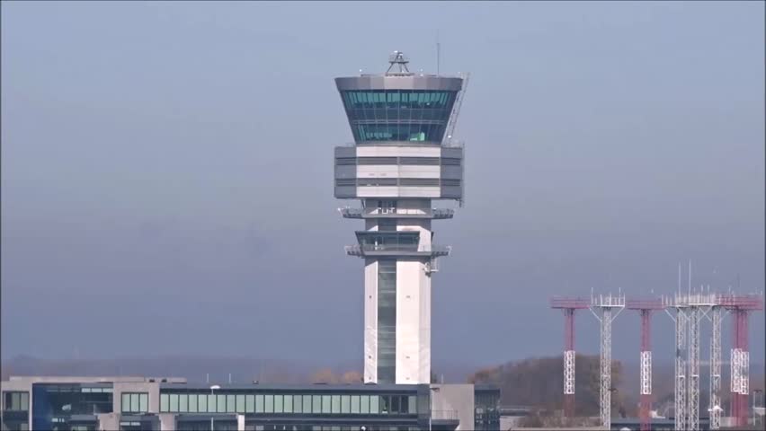 Airport Control Tower in Beautiful Sunshine at Major International Airport