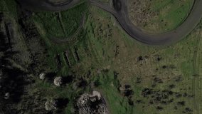 Aerial top view of rally roads in field filming by drone. 