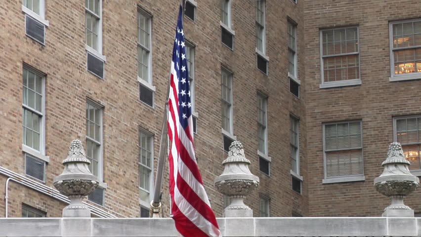 View of American flag in front of Mayflower Hotel in Washington DC, USA