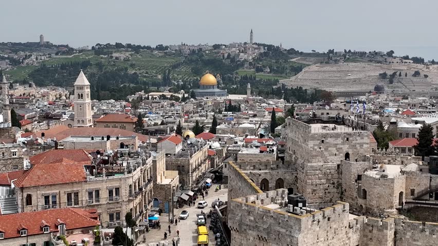 Jerusalem the old city streets and golden dome of the rock, Aerial

Drone view from the old city of Jerusalem, 4K, march, 2023 
