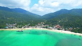 Koh Phangan is also home to a number of man-made structures that are equally impressive from above. with intricate details and bright colors that pop against the island's natural landscape. Thailand
