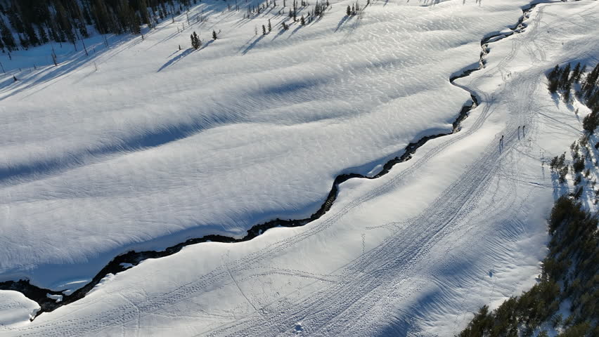 The narrow White River flows down from Mt. Hood in the Mount Hood National Forest in Oregon. This part of the Pacific Northwest is known for its vast natural resources.